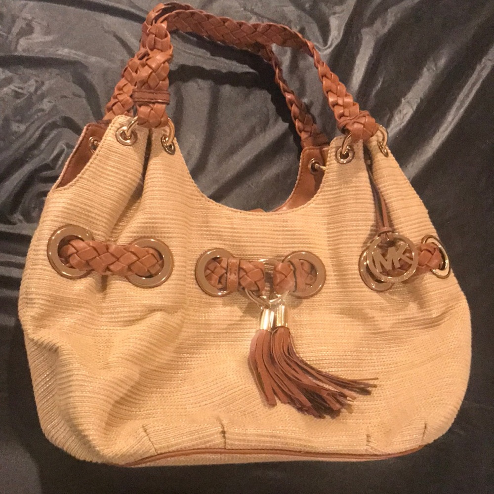 Michael Kors satchel, spacious and versatile